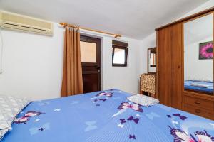 Postel nebo postele na pokoji v ubytování Apartments Jase