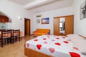 Postel nebo postele na pokoji v ubytování Apartments Jase