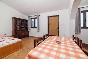 Postel nebo postele na pokoji v ubytování Apartments Jase
