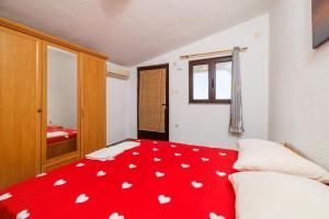 Postel nebo postele na pokoji v ubytování Apartments Jase