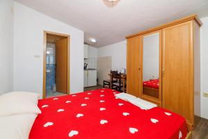 Postel nebo postele na pokoji v ubytování Apartments Jase