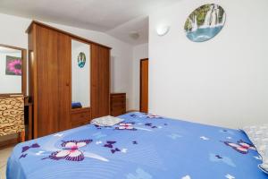Postel nebo postele na pokoji v ubytování Apartments Jase
