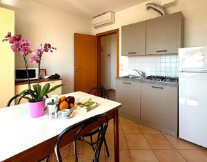 Een keuken of kitchenette bij Residence Carioca