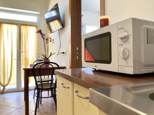 Een keuken of kitchenette bij Residence Carioca