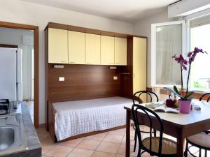 Een keuken of kitchenette bij Residence Carioca
