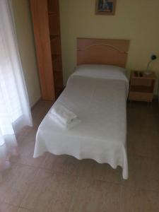 Postel nebo postele na pokoji v ubytování Hostal Jose Luis