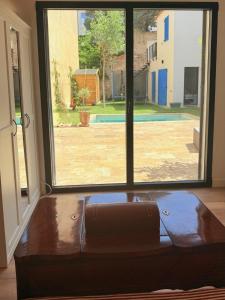 Posedenie v ubytovaní La corniche familiale - magnifique maison avec jardin et piscine à deux pas de la plage