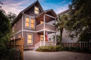 a house with a flag in front of it at 1104 Demere Road in Saint Simons Island