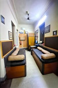 Postel nebo postele na pokoji v ubytování The Kei Suites