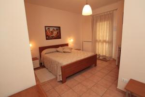 Postel nebo postele na pokoji v ubytování B&B Il Borgodmd