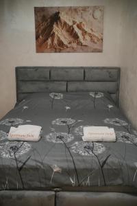 En eller flere senge i et værelse på Green Hills Susic II