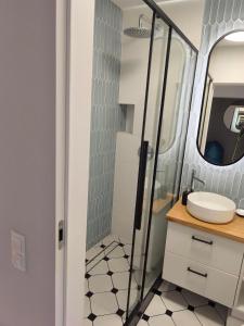 Koupelna v ubytování Sleepy3city with Sea View