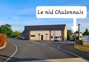 a white car parked in front of a building at Le Nid Chalonnais in Chalonnes-sur-Loire