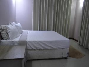 Postel nebo postele na pokoji v ubytování Sami BnB - Apt 04 Makongo after Mlimani City