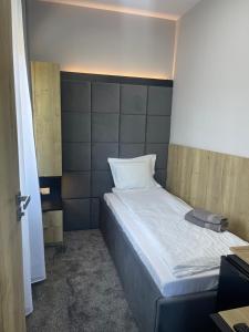 Postel nebo postele na pokoji v ubytování NOVA Apartamenty&Pokoje