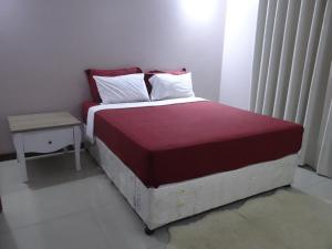 Postel nebo postele na pokoji v ubytování Sami BnB - Apt 04 Makongo after Mlimani City