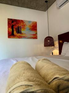 Hotel Zendero Tulum客房内的一张或多张床位