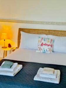 Ein Bett oder Betten in einem Zimmer der Unterkunft Budva Felix Suites