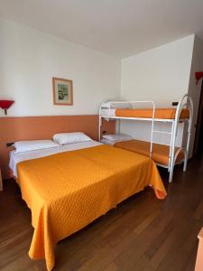 Postel nebo postele na pokoji v ubytování Hotel Verdeneve