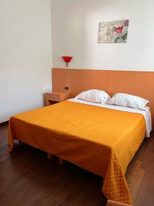 Postel nebo postele na pokoji v ubytování Hotel Verdeneve