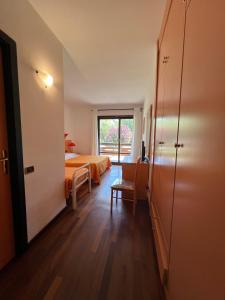 Postel nebo postele na pokoji v ubytování Hotel Verdeneve