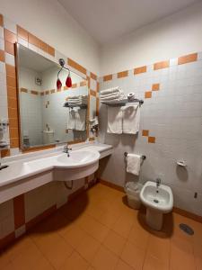 Koupelna v ubytování Hotel Verdeneve