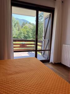 Postel nebo postele na pokoji v ubytování Hotel Verdeneve