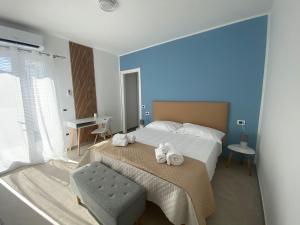 Postel nebo postele na pokoji v ubytování DOMO DE MARIA