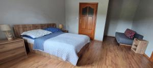 Postel nebo postele na pokoji v ubytování Agroturystyka przy Trakcie w Krzywem + 20 fotografií
