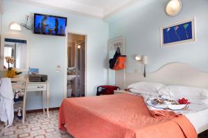 TV a/nebo společenská místnost v ubytování Hotel Cadiz