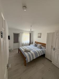 Postel nebo postele na pokoji v ubytování Sleep In oxford