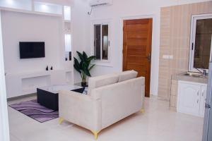 Televisyen dan/atau pusat hiburan di Appartement meublé