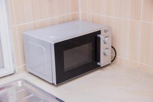 Dapur atau dapur kecil di Appartement meublé