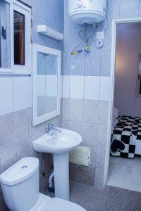 Bilik mandi di Appartement meublé