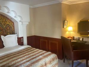 Postel nebo postele na pokoji v ubytování Riad Mayfez Suites & Spa