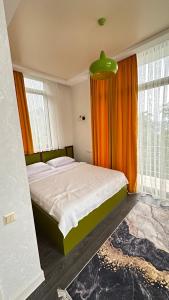 Postel nebo postele na pokoji v ubytování Villa Mandarina