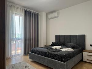 Postel nebo postele na pokoji v ubytování Orkidea Apartments