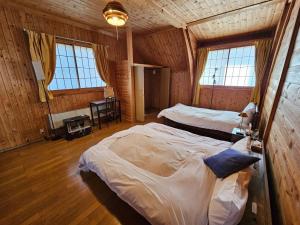 Postel nebo postele na pokoji v ubytování Nasu Royal Villa - Vacation STAY 18433