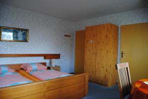 Postel nebo postele na pokoji v ubytování Schule 5