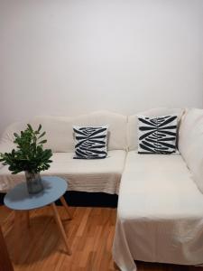 a living room with a couch and a table at Maris in Banjole