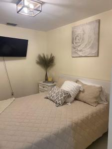 Ένα ή περισσότερα κρεβάτια σε δωμάτιο στο Sweetwater Villa