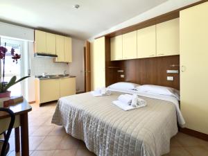 Postel nebo postele na pokoji v ubytování Residence Algarve