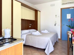 Postel nebo postele na pokoji v ubytování Residence Algarve