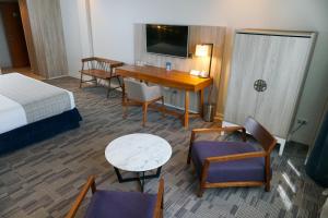 Postel nebo postele na pokoji v ubytování Hotel Parada Linares