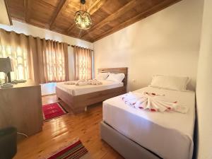 Ένα ή περισσότερα κρεβάτια σε δωμάτιο στο Hotel Borklad