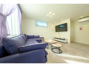 Televiisor ja/või meelelahutuskeskus majutusasutuses Condo Stay Kamakura Sakanoshita Nozomi - Vacation STAY 18875