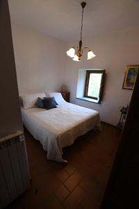 Postel nebo postele na pokoji v ubytování Casa Maria