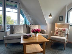 Posezení v ubytování Ferienwohnung Nr 07 OG Spitzboden