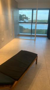 Ένα ή περισσότερα κρεβάτια σε δωμάτιο στο BARRA FLATS BY LOUI