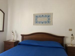 Postel nebo postele na pokoji v ubytování Casa Indipendente I DUE MARI